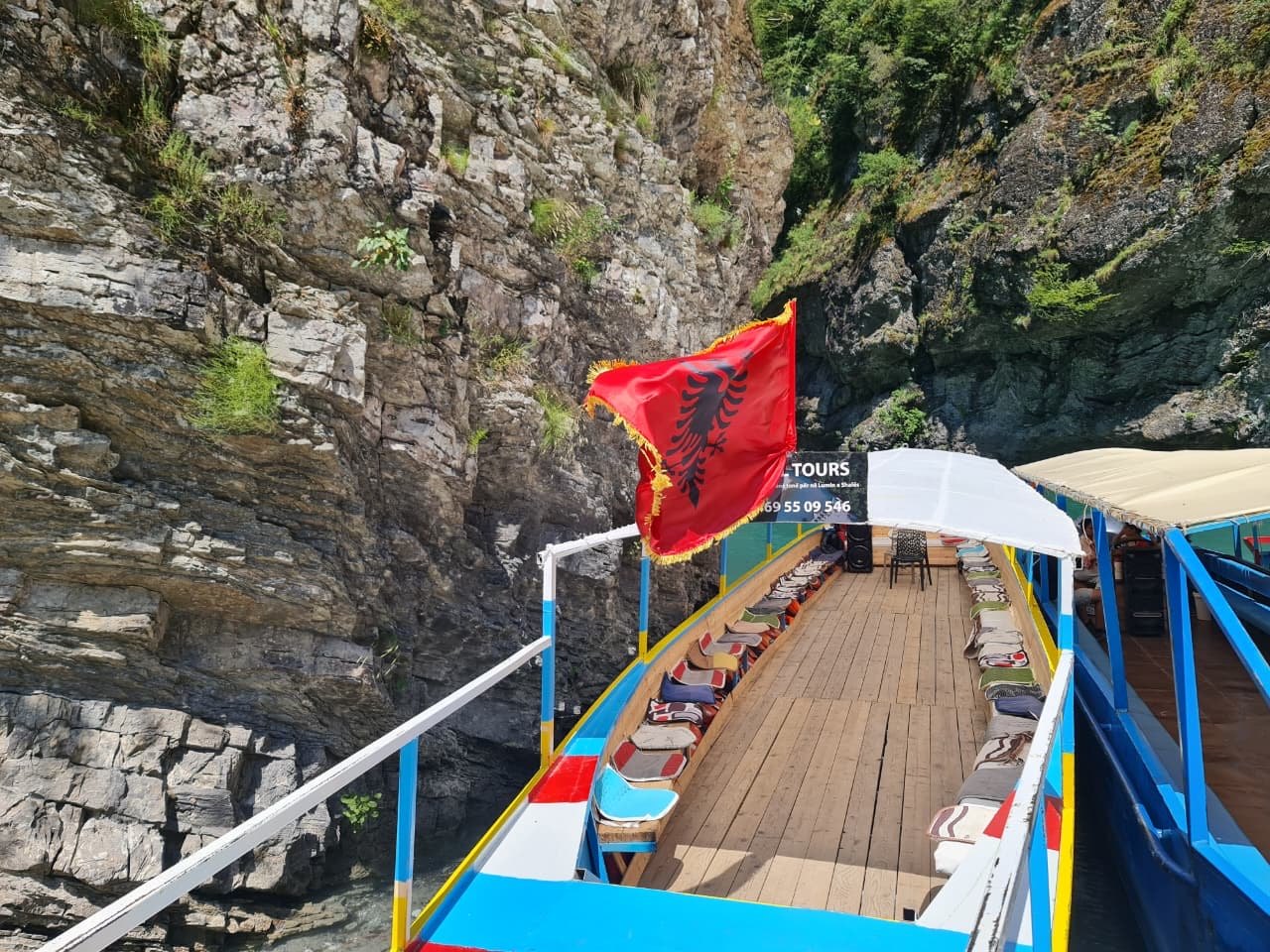 Mariel Tours boat and Albanian flag