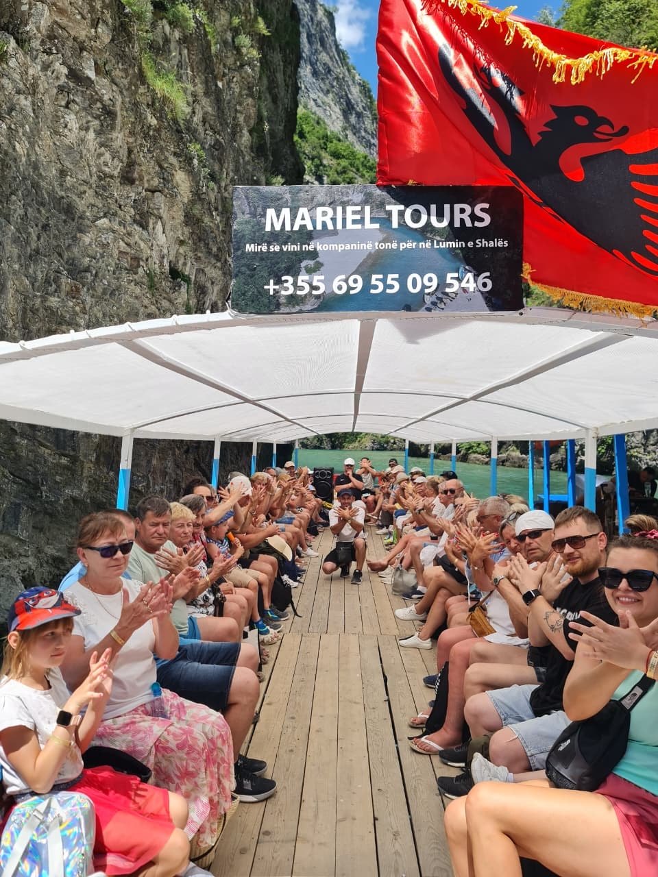 Passengers aboard the boat from Koman